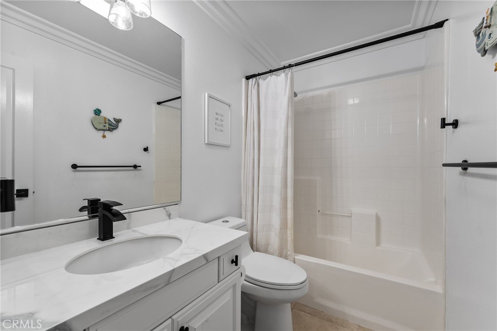 10 Bower Tree Irvine, CA 92603 - Photo 23 of 37 a bathroom with a sink toilet and shower