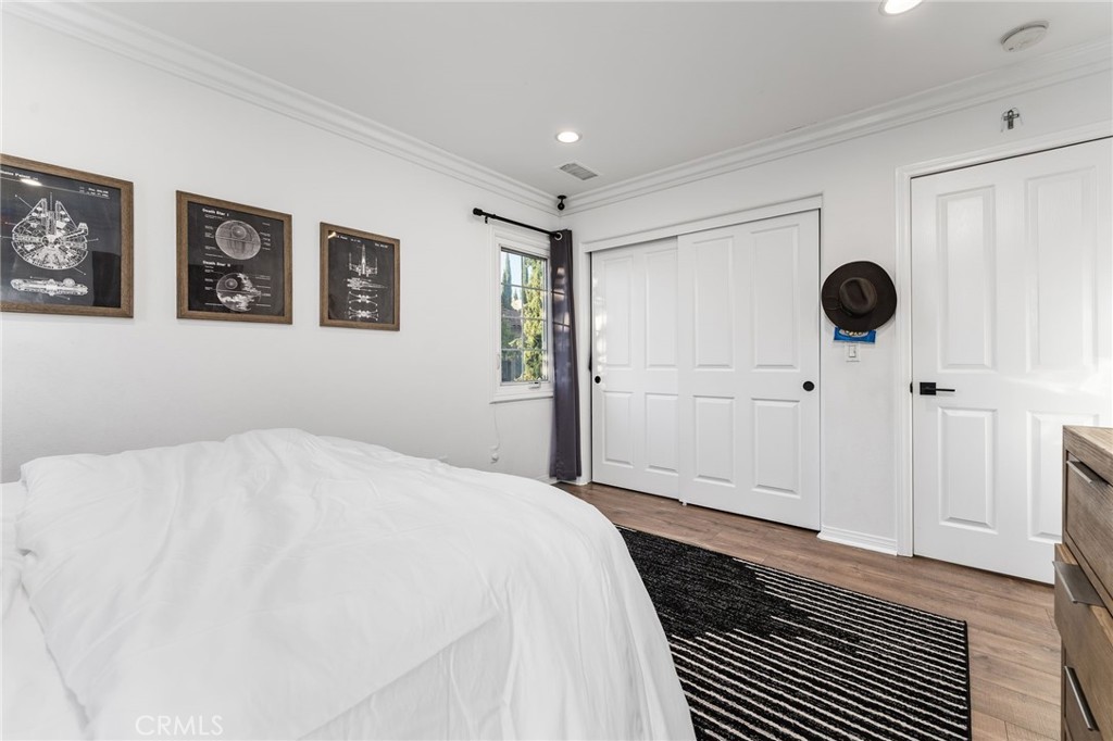10 Bower Tree Irvine, CA 92603 - Photo 25 of 37 a bedroom with a bed and a window