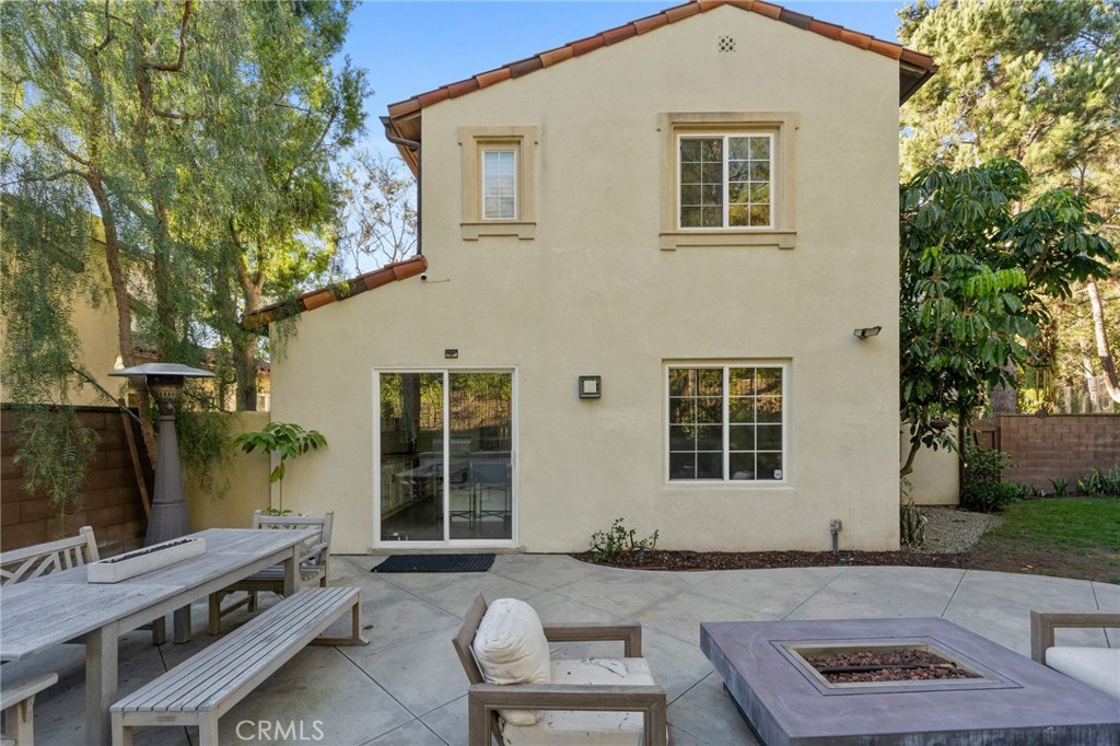 10 Bower Tree Irvine, CA 92603 - Photo 26 of 37 a backyard of a house with outdoor seating