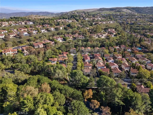 an aerial view of a city with lots of residential buildings