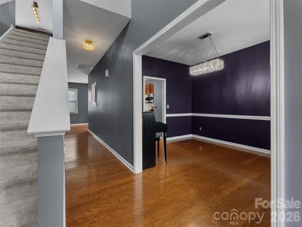 a view of a hallway with entryway