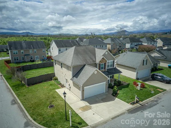 an aerial view of a house with a garden