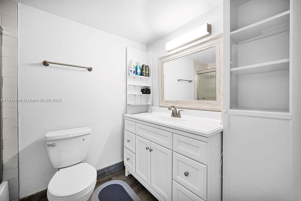 18041 Biscayne Boulevard, Unit 1201 Aventura, FL 33160 - Photo 13 of 42 Updated bathroom with sleek vanity, bright lighting, and designer tile — offering both function and style.