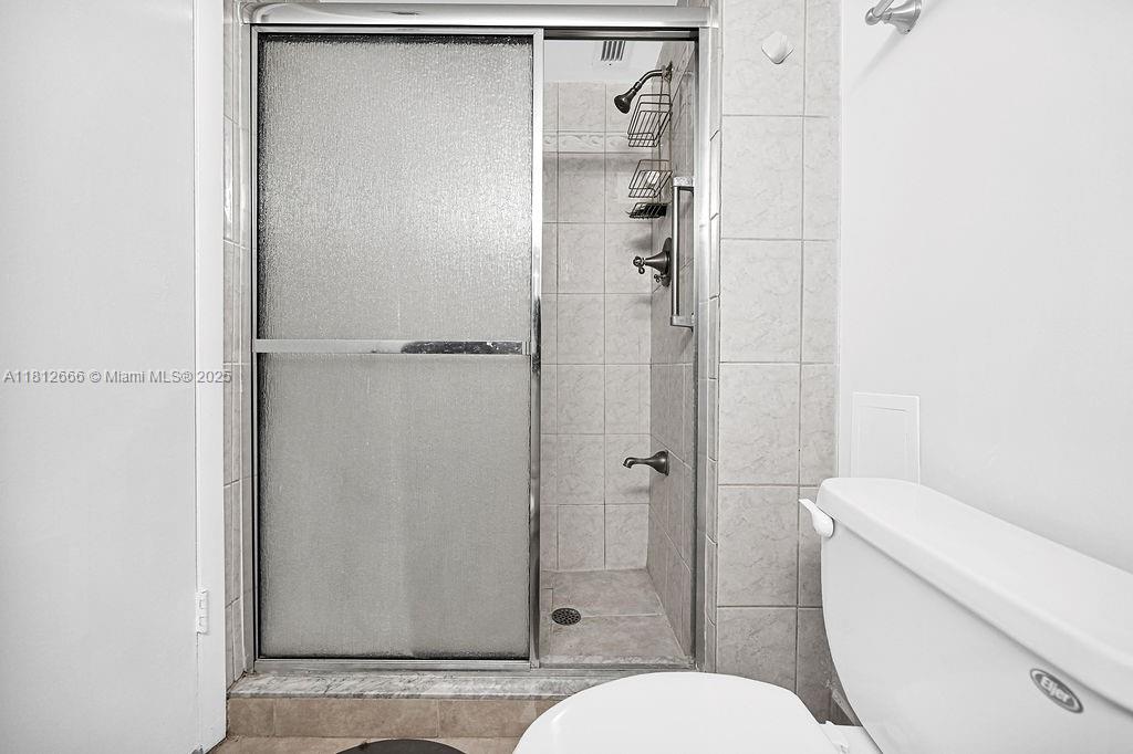 18041 Biscayne Boulevard, Unit 1201 Aventura, FL 33160 - Photo 19 of 42 Clean and bright half bathroom with minimalist design — perfect for guests.