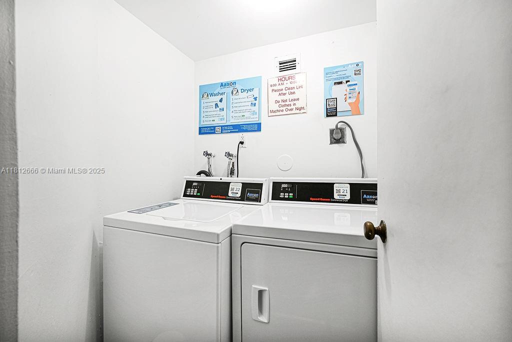 18041 Biscayne Boulevard, Unit 1201 Aventura, FL 33160 - Photo 23 of 42 Convenient in-unit laundry area with full-size washer and dryer — a must-have for modern living.