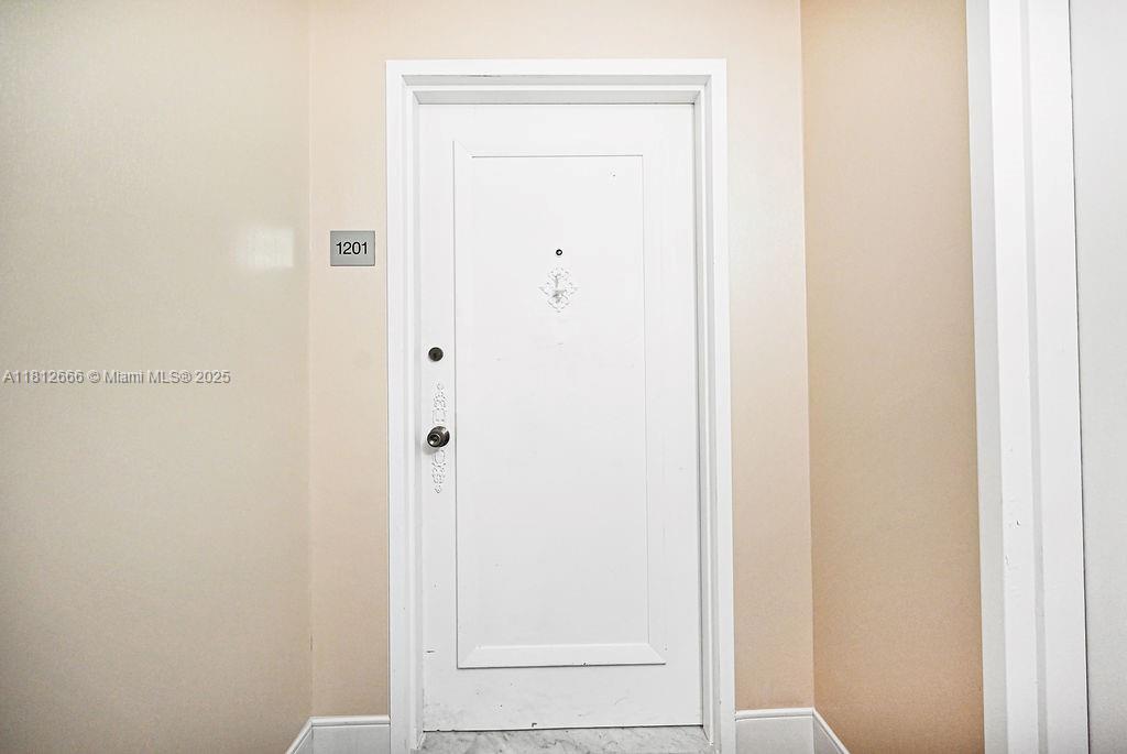 18041 Biscayne Boulevard, Unit 1201 Aventura, FL 33160 - Photo 25 of 42 Welcoming entry foyer that sets the tone for a modern, move-in-ready condo in a luxury Aventura building.