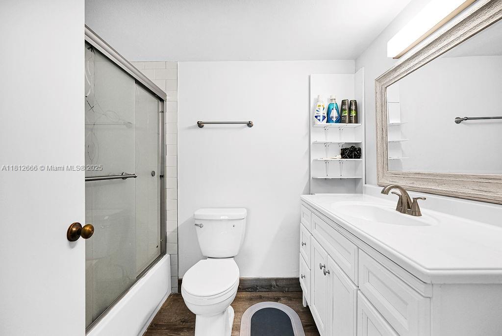 18041 Biscayne Boulevard, Unit 1201 Aventura, FL 33160 - Photo 10 of 42 Beautifully renovated bathroom featuring a glass shower, elegant tile, and modern fixtures — spa-inspired relaxation at home.