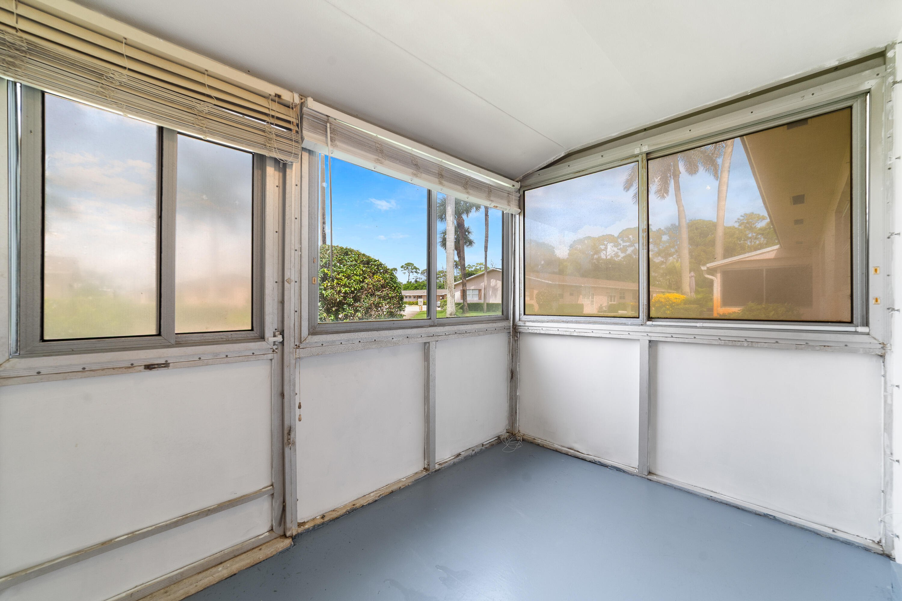 2567 Dudley Drive West, Unit F West Palm Beach, FL 33415 - Photo 27 of 41 a view of a large window with an outdoor view