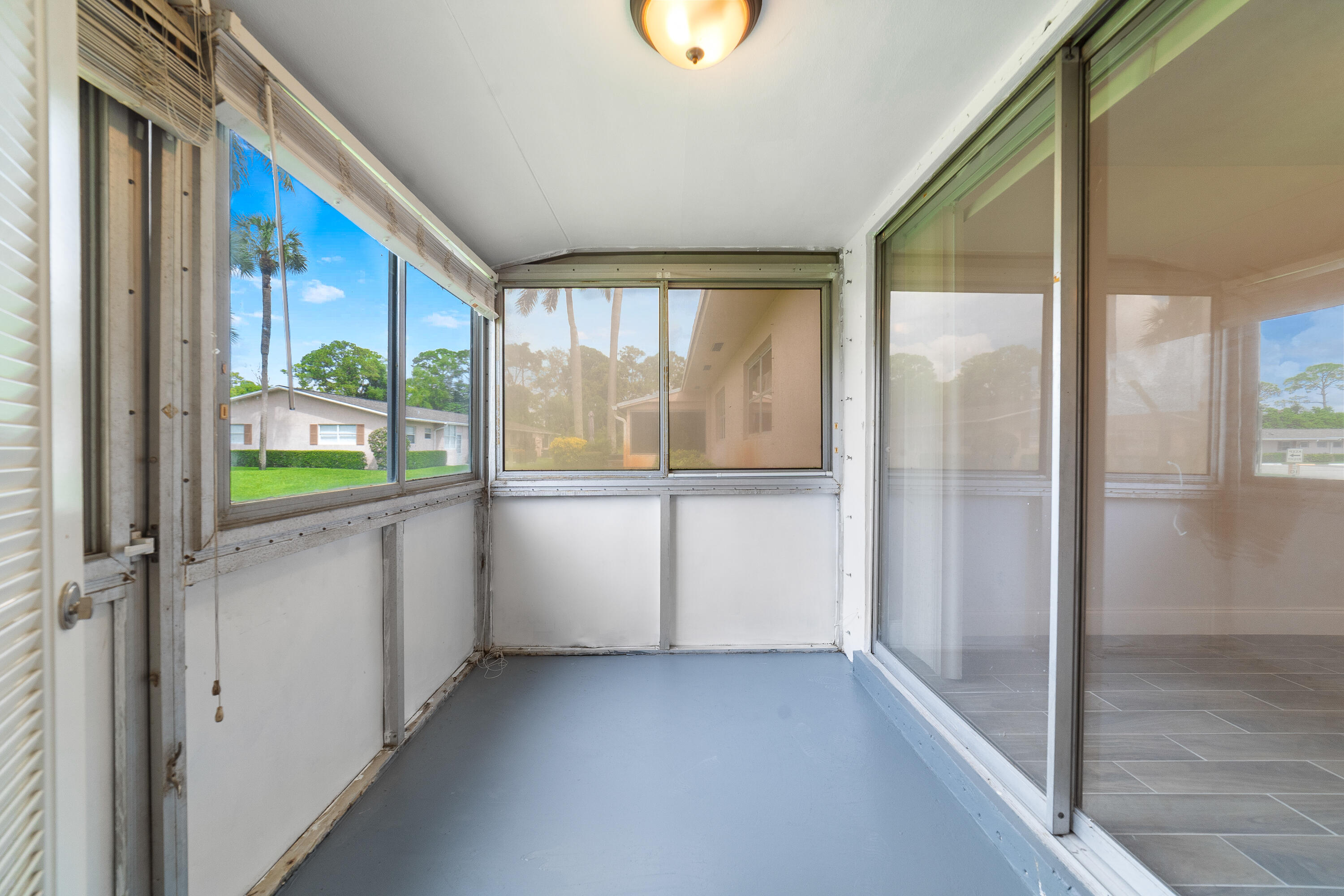 2567 Dudley Drive West, Unit F West Palm Beach, FL 33415 - Photo 29 of 41 a view of a room with window