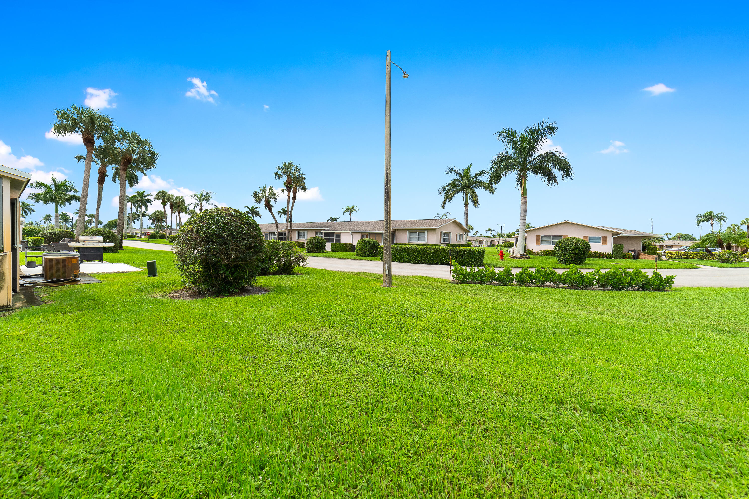 2567 Dudley Drive West, Unit F West Palm Beach, FL 33415 - Photo 32 of 41 a view of a garden