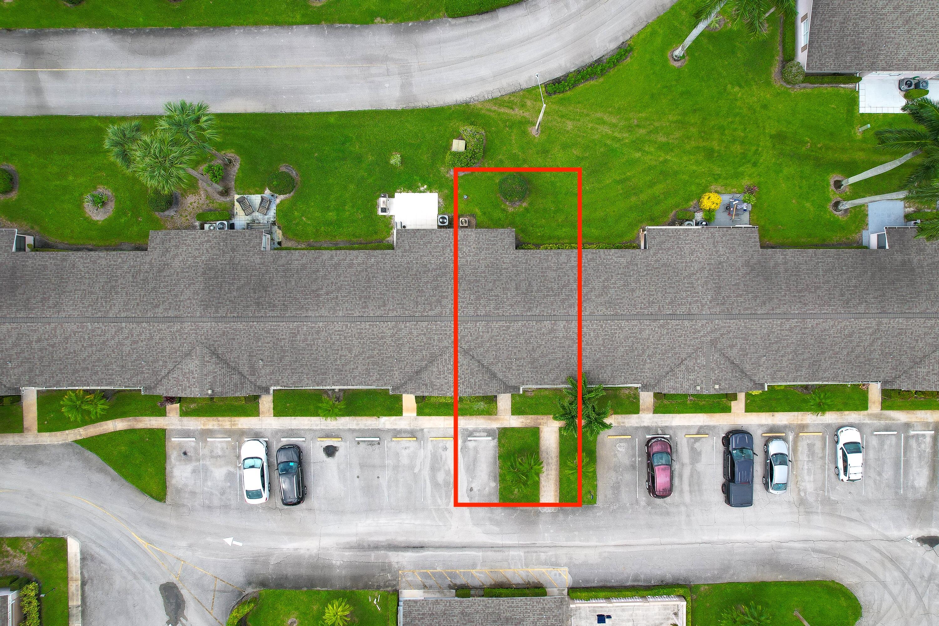 2567 Dudley Drive West, Unit F West Palm Beach, FL 33415 - Photo 35 of 41 a view of outdoor space with seating area and green space