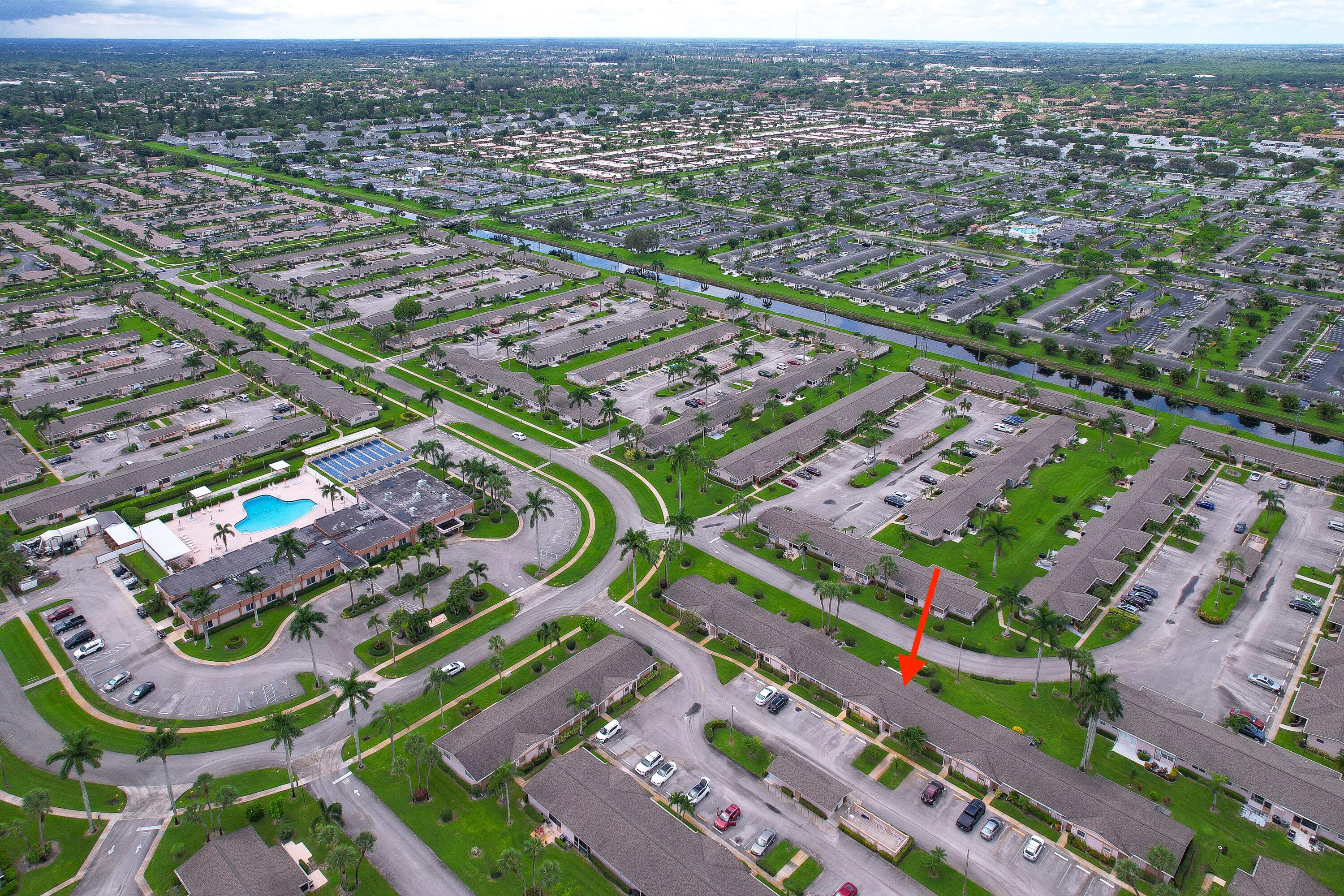 2567 Dudley Drive West, Unit F West Palm Beach, FL 33415 - Photo 37 of 41 an aerial view of a city