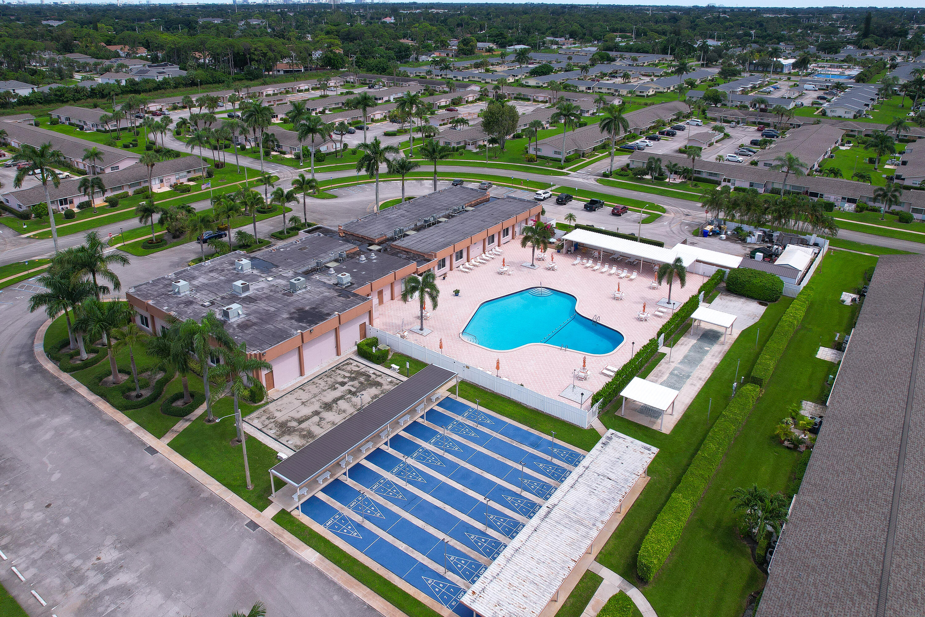 2567 Dudley Drive West, Unit F West Palm Beach, FL 33415 - Photo 39 of 41 an aerial view of a backyard