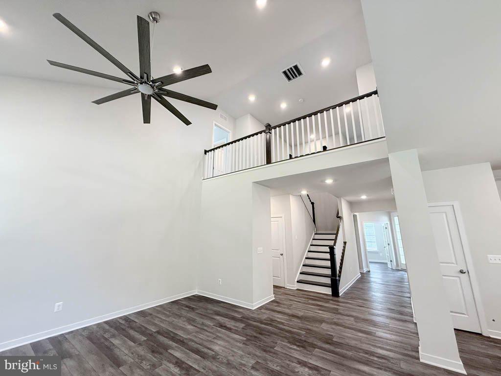 9213 Moldova Road Chesterfield, VA 23832 - Photo 19 of 51 a view of a hallway with wooden floor and stairs