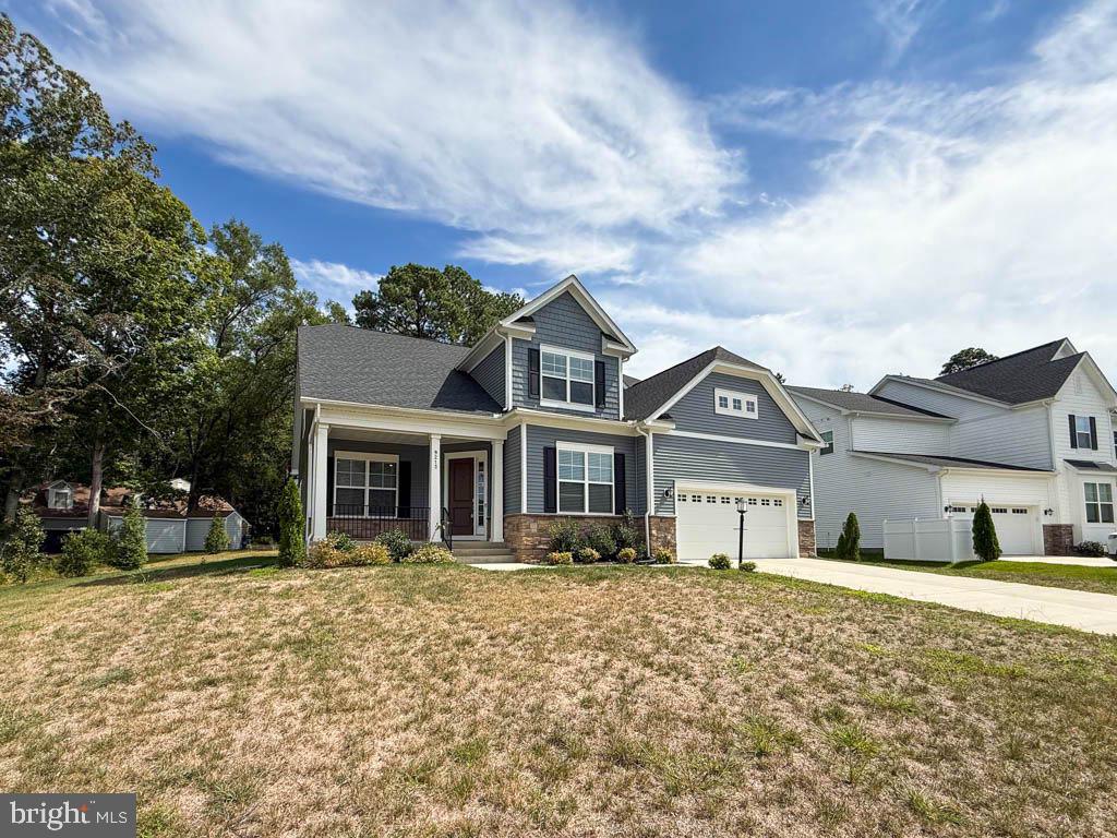9213 Moldova Road Chesterfield, VA 23832 - Photo 3 of 51 a front view of a house with a yard