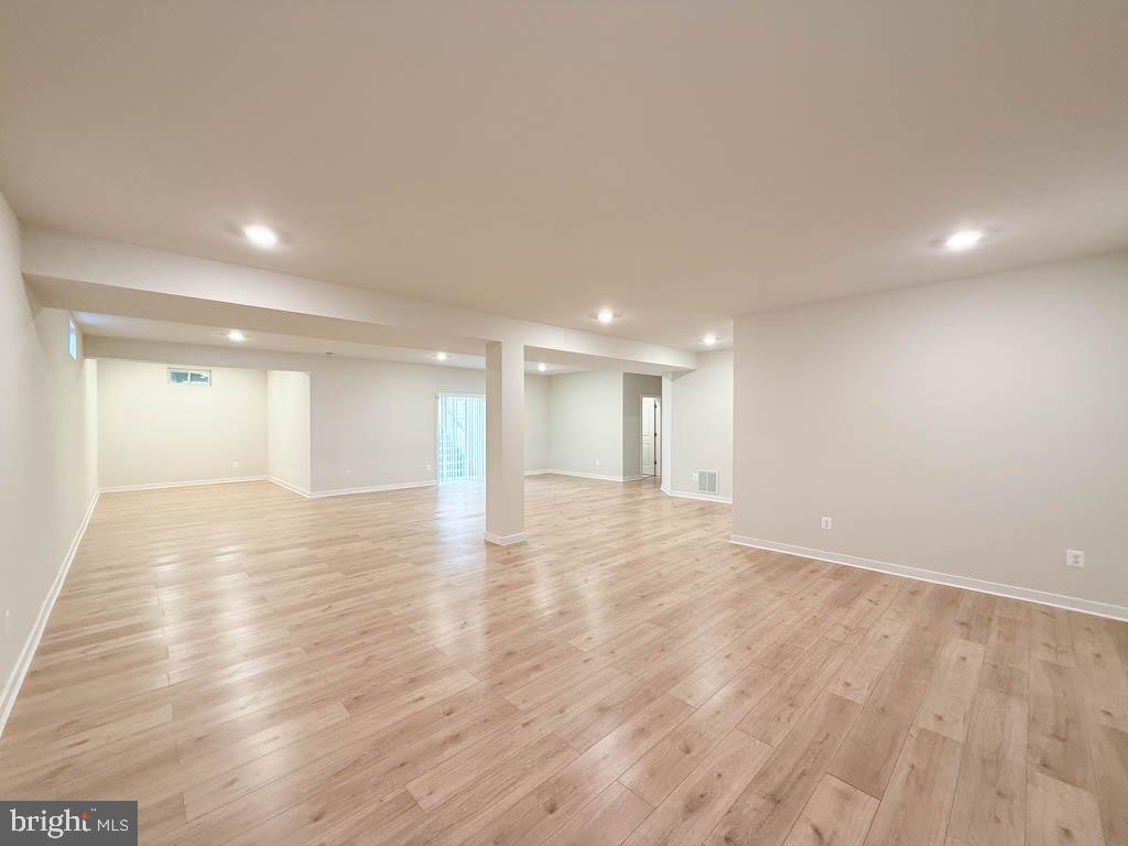 9213 Moldova Road Chesterfield, VA 23832 - Photo 42 of 51 a view of an empty room with wooden floor