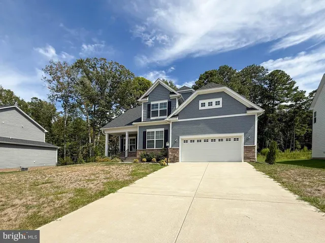 front view of house with a yard