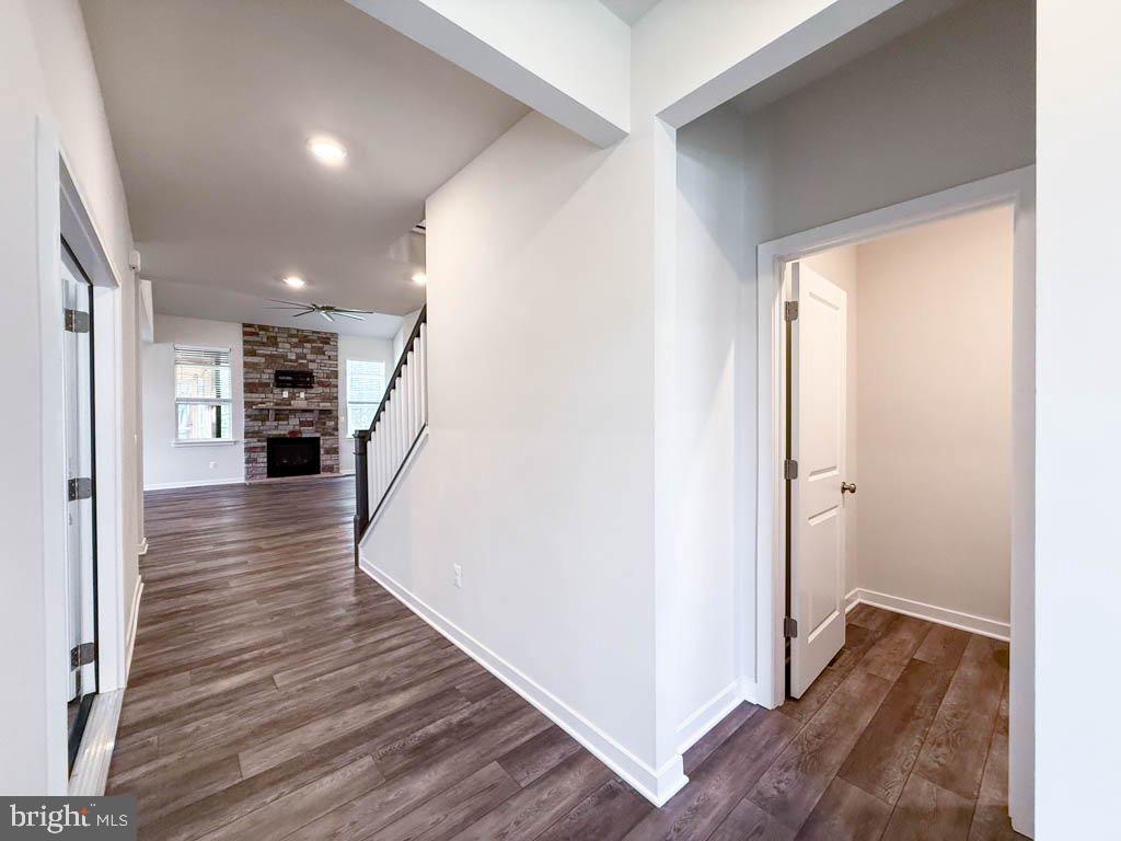 9213 Moldova Road Chesterfield, VA 23832 - Photo 9 of 51 a view of a hallway with wooden floor and staircase