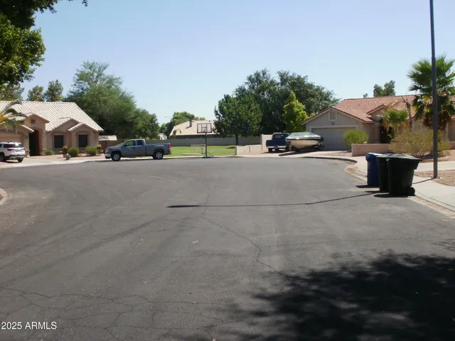 a view of a street with cars