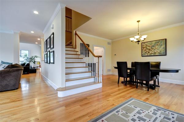 86 McCarthy Road Newton, MA 02459 - Photo 2 of 29 a view of a dining room with furniture wooden floor and a chandelier