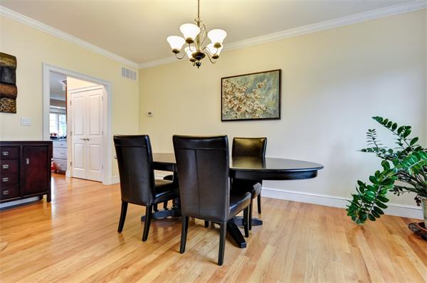 86 McCarthy Road Newton, MA 02459 - Photo 5 of 29 a view of a dining room with furniture and wooden floor