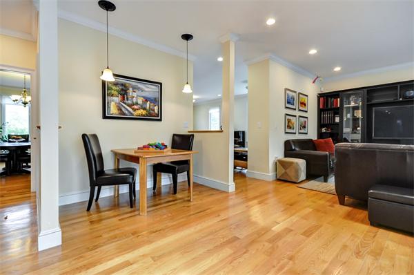 86 McCarthy Road Newton, MA 02459 - Photo 10 of 29 a living room with furniture and a flat screen tv