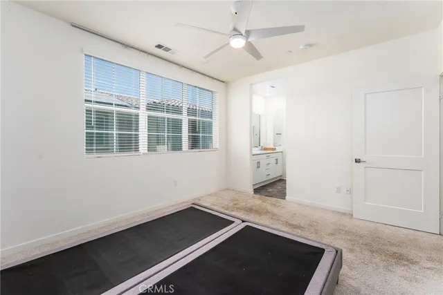 a bathroom with a double vanity sink and mirror