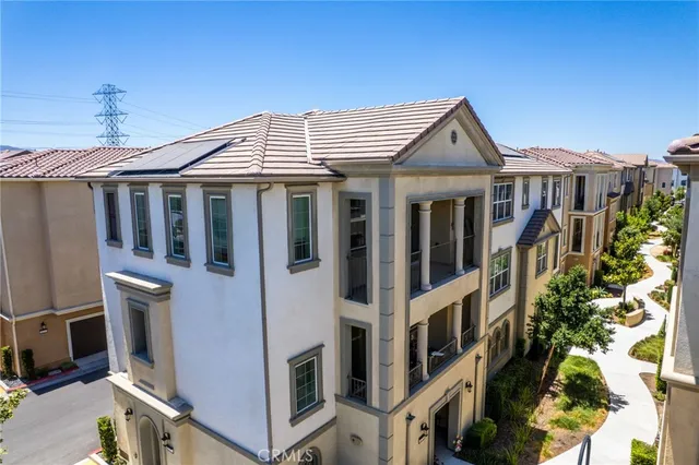 an aerial view of a city with lots of residential buildings