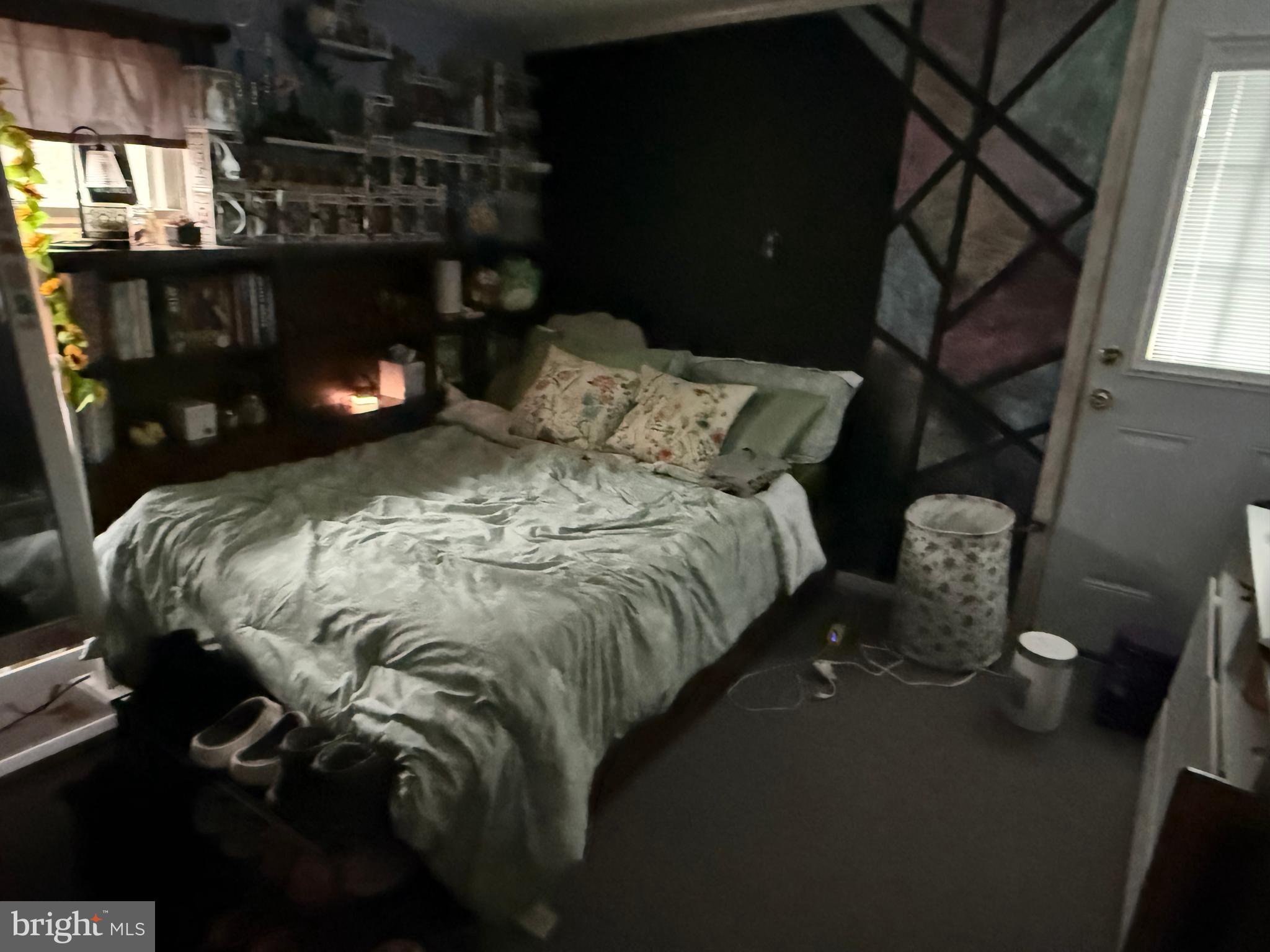 33 Paducah Road Mount Holly, NJ 08060 - Photo 20 of 21 a bed sitting in a bedroom next to a window