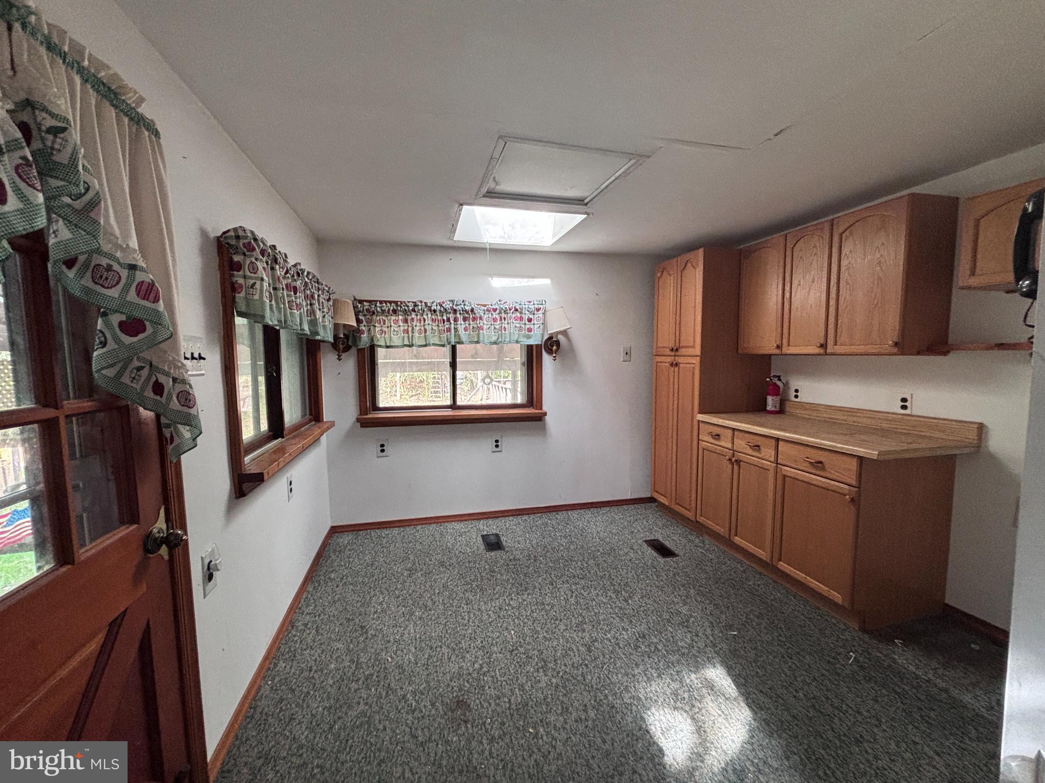 33 Paducah Road Mount Holly, NJ 08060 - Photo 5 of 21 a kitchen with stainless steel appliances granite countertop a refrigerator a sink dishwasher a stove and white countertops with wooden floor