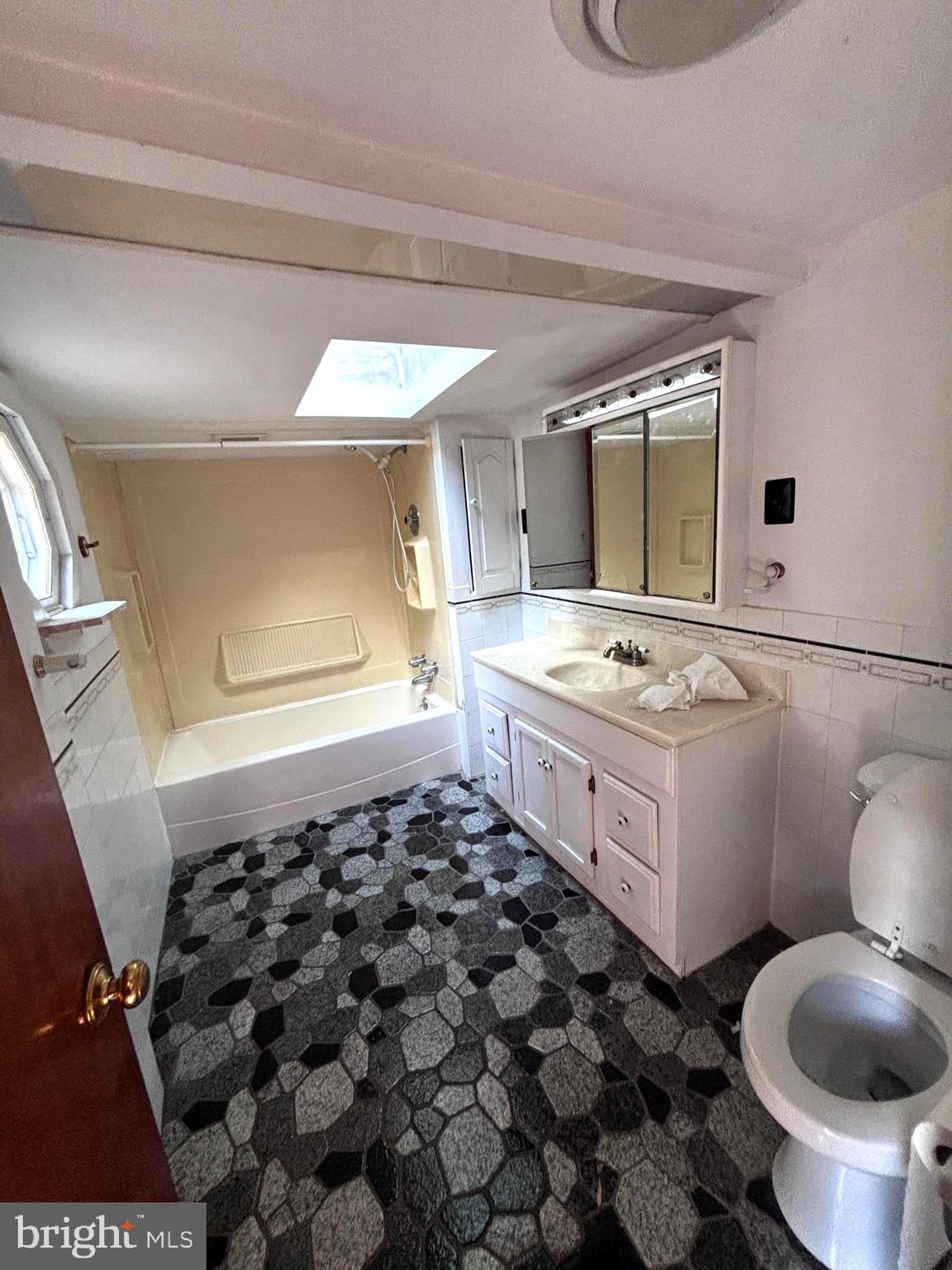33 Paducah Road Mount Holly, NJ 08060 - Photo 6 of 21 a bathroom with a bathtub sink and toilet
