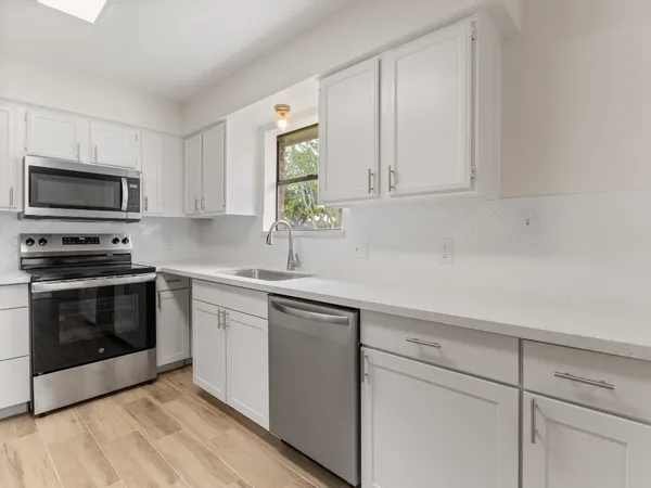 a view of room with hardwood floor