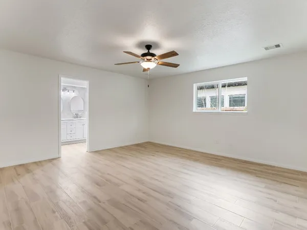 a bathroom with a double vanity sink and mirror