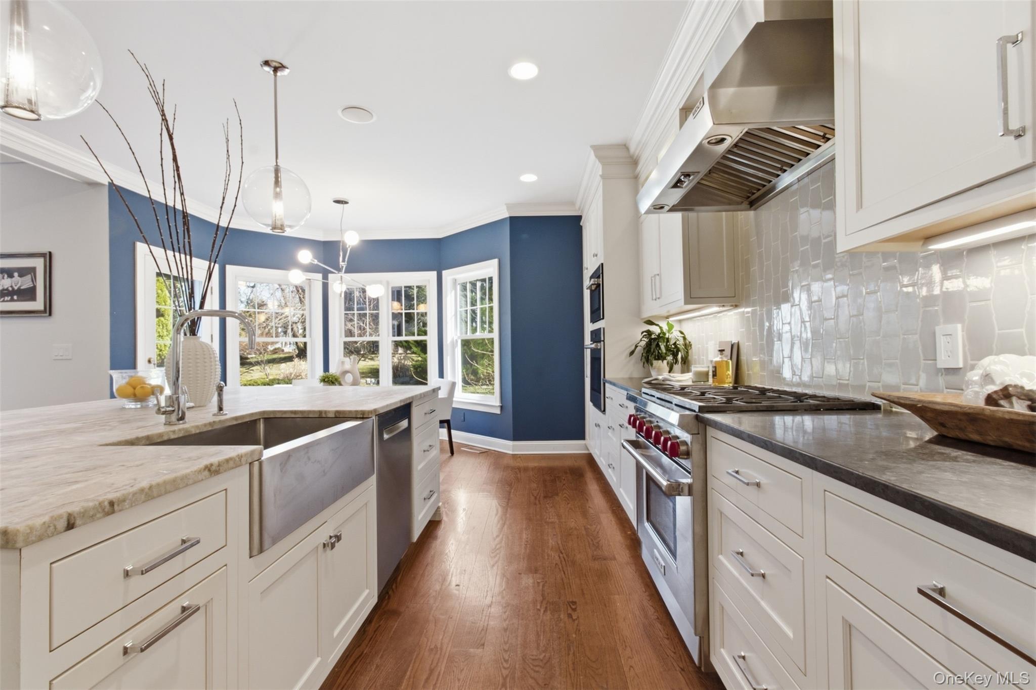 4 Johnson Place Rye, NY 10580 - Photo 14 of 44 Kitchen with breakfast nook, large quartzite center island, coffee bar, Wolf/Thermador appliances