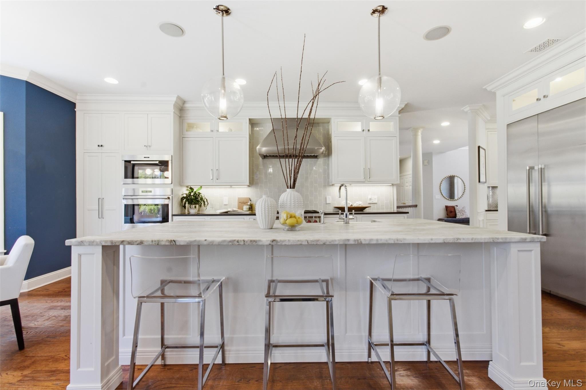 4 Johnson Place Rye, NY 10580 - Photo 16 of 44 Kitchen with breakfast nook, large quartzite center island, coffee bar, Wolf/Thermador appliances