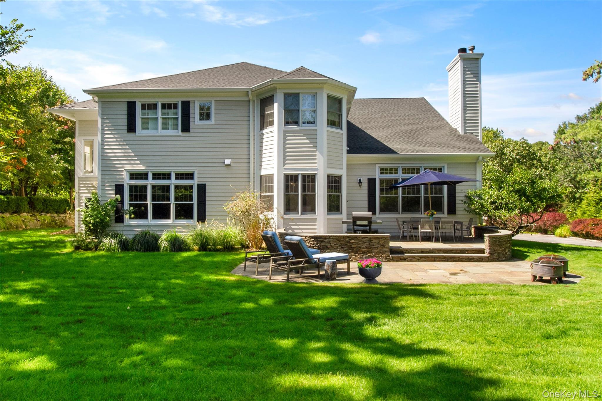 4 Johnson Place Rye, NY 10580 - Photo 2 of 44 Large private backyard with ample space for a pool, play and gardens