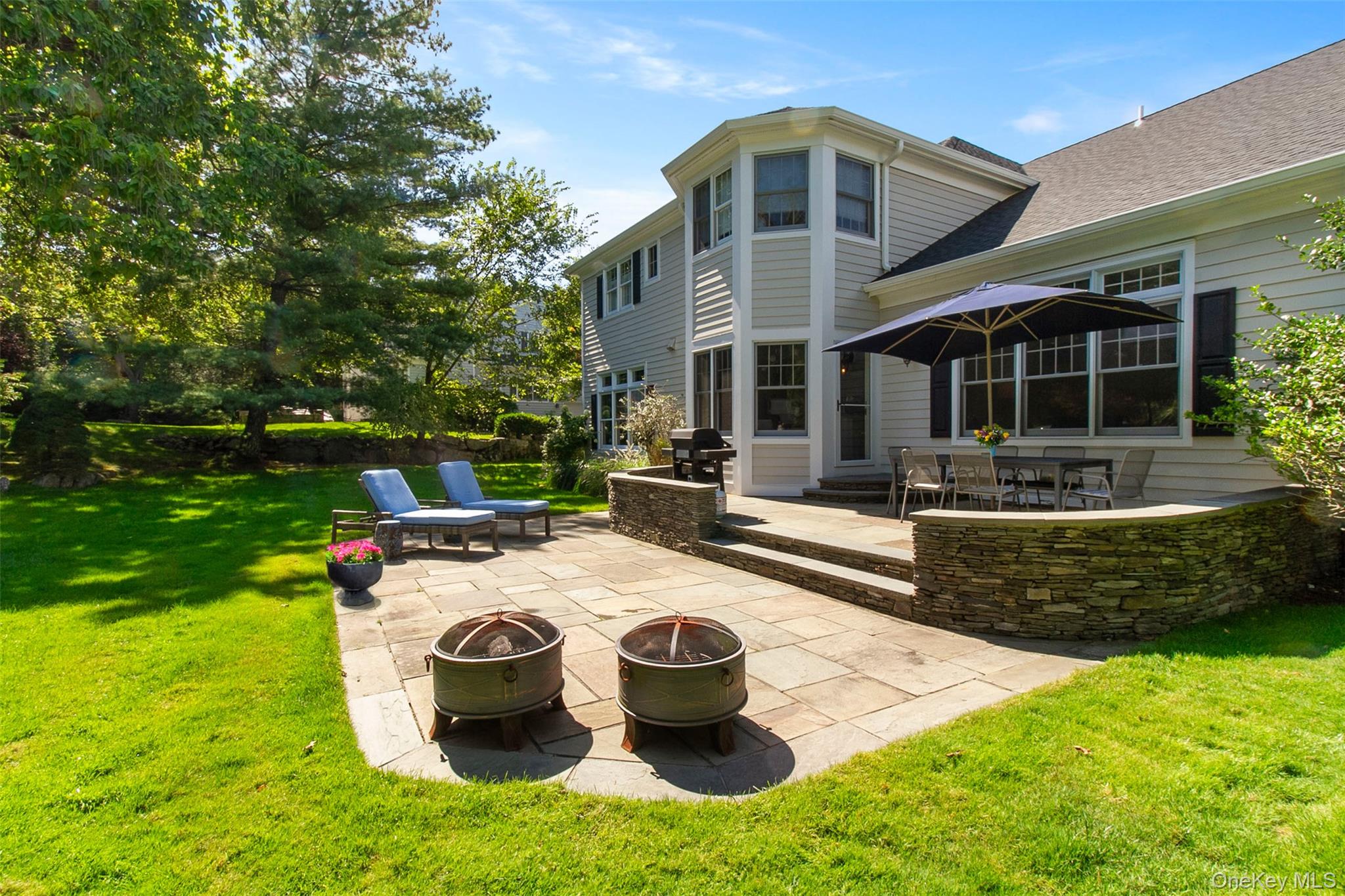 4 Johnson Place Rye, NY 10580 - Photo 3 of 44 Large private backyard with ample space for a pool, play and gardens