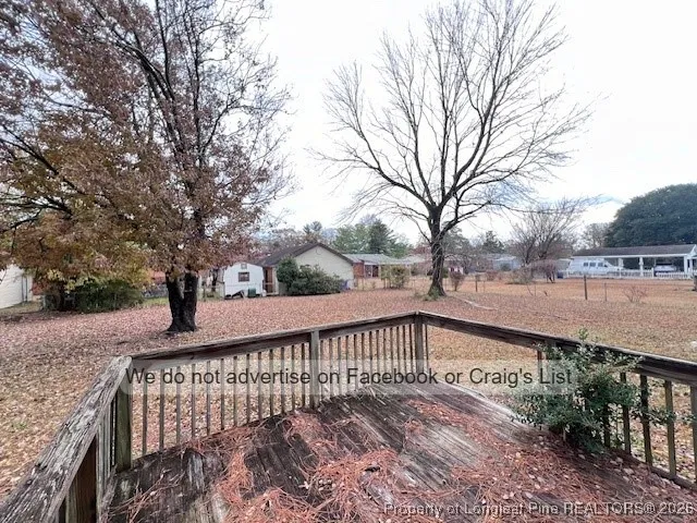 a view of a street with a trees
