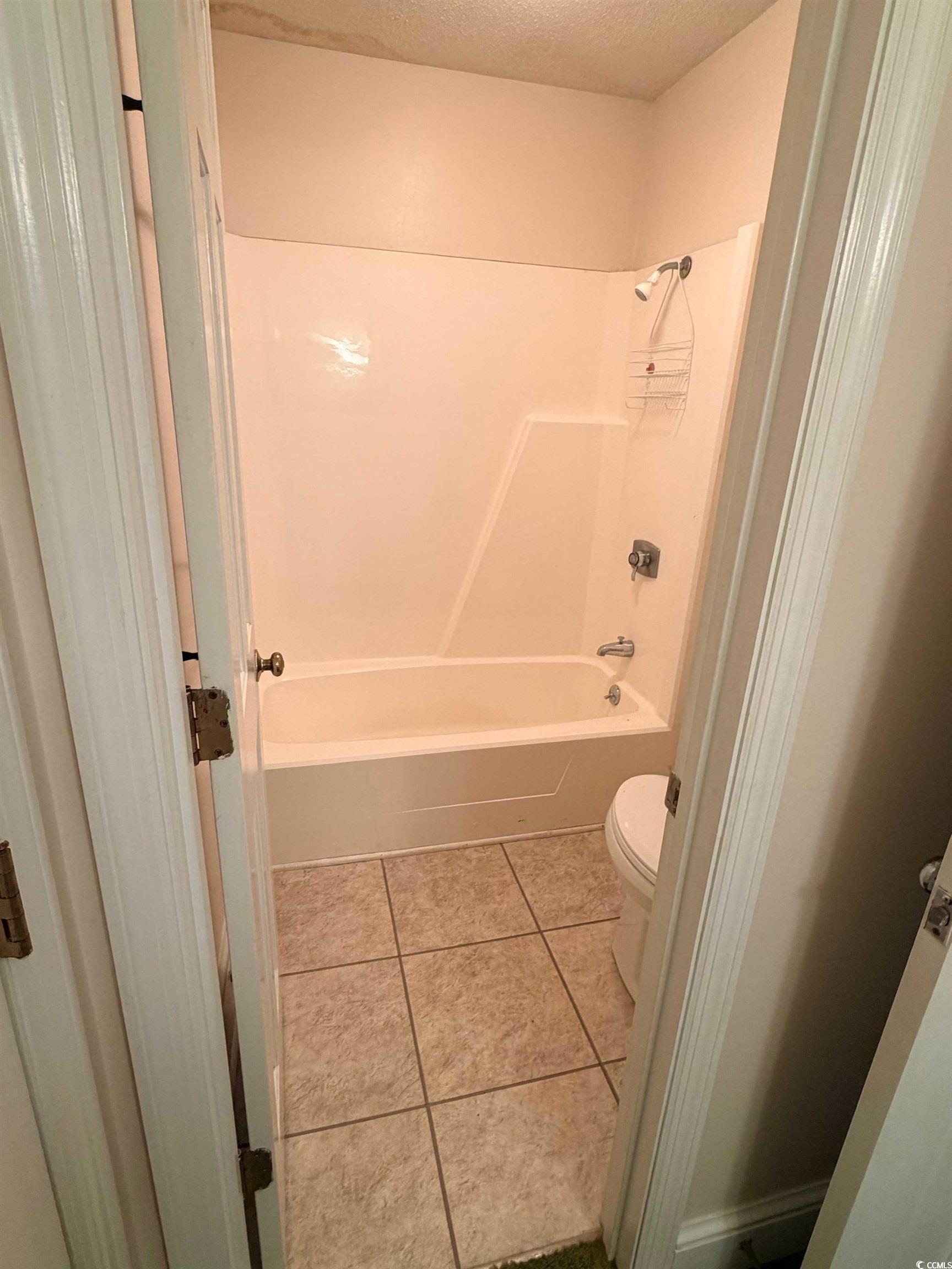 1320 Horseshoe Road Mullins, SC 29574 - Photo 11 of 22 View of property exterior featuring brick siding, a lawn, and a porch