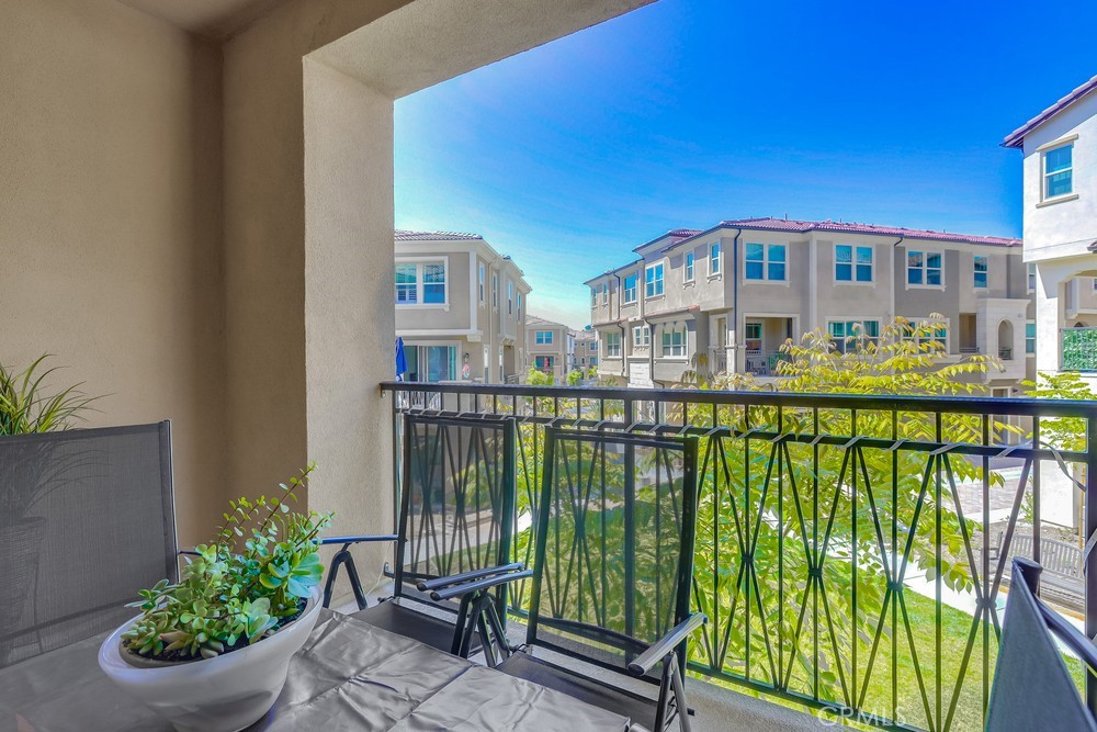 104 Alder Ridge Lake Forest, CA 92610 - Photo 24 of 74 a front view of a house with a garden