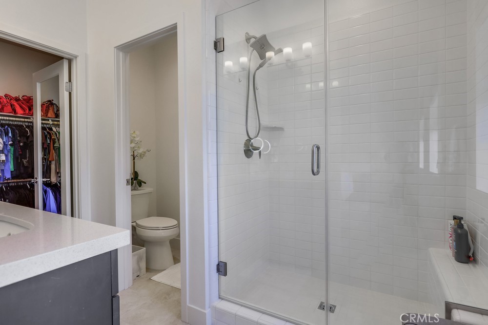 104 Alder Ridge Lake Forest, CA 92610 - Photo 40 of 74 a bathroom with a shower a toilet and sink