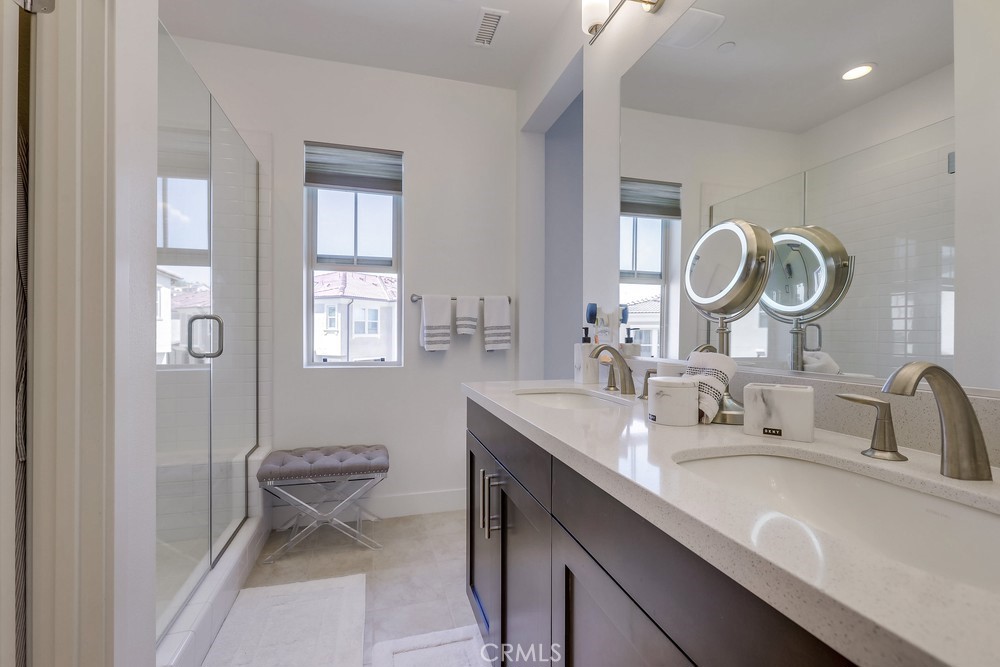 104 Alder Ridge Lake Forest, CA 92610 - Photo 41 of 74 a bathroom with a granite countertop sink and a mirror