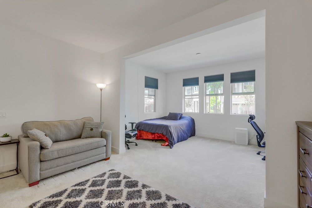 104 Alder Ridge Lake Forest, CA 92610 - Photo 53 of 74 a living room with furniture and a window