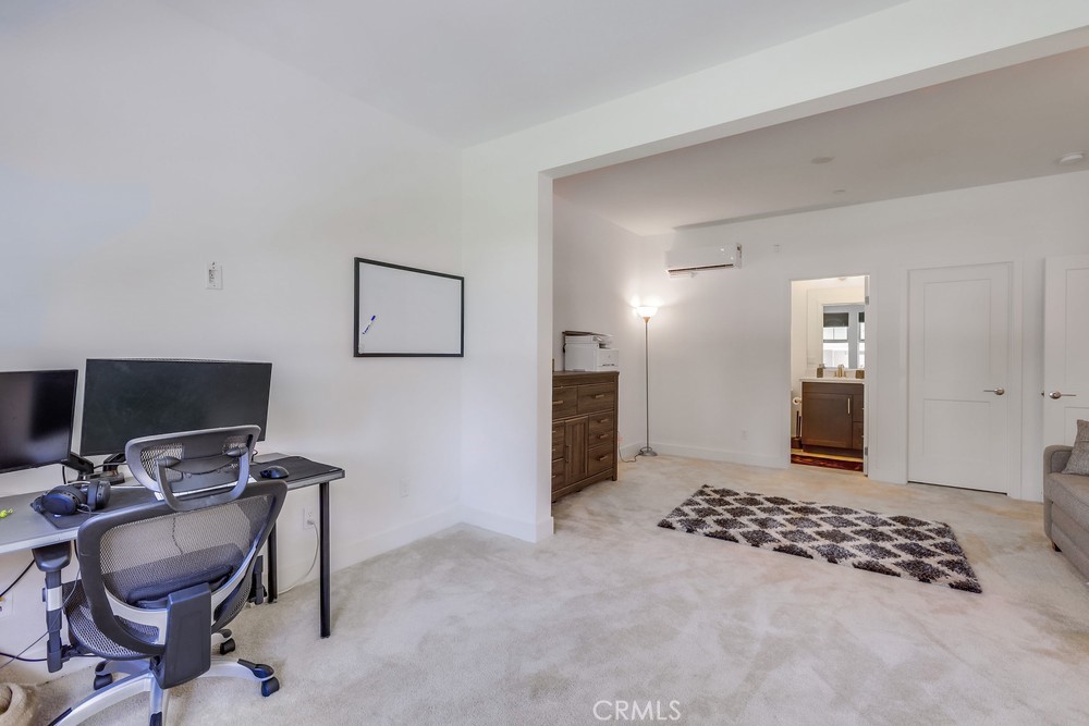 104 Alder Ridge Lake Forest, CA 92610 - Photo 54 of 74 a view of a workspace with furniture and a window