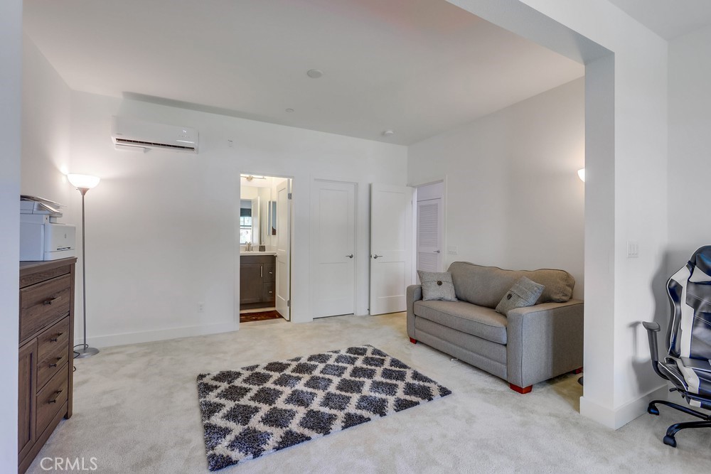 104 Alder Ridge Lake Forest, CA 92610 - Photo 55 of 74 a living room with furniture and a rug