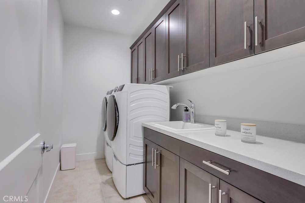 104 Alder Ridge Lake Forest, CA 92610 - Photo 57 of 74 a bathroom with a toilet sink and mirror