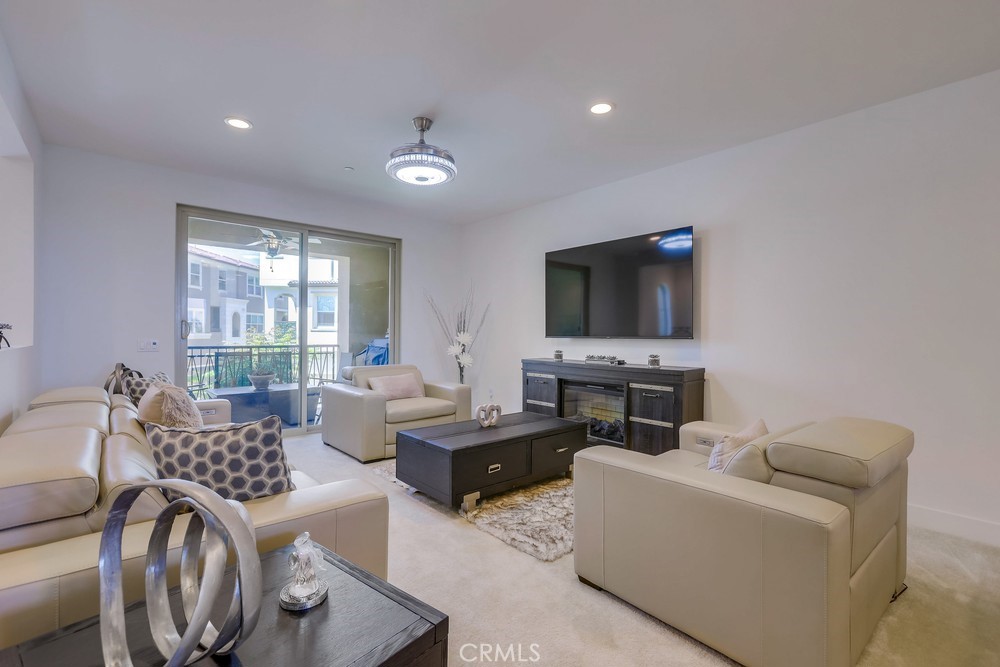 104 Alder Ridge Lake Forest, CA 92610 - Photo 6 of 74 a living room with furniture and a flat screen tv