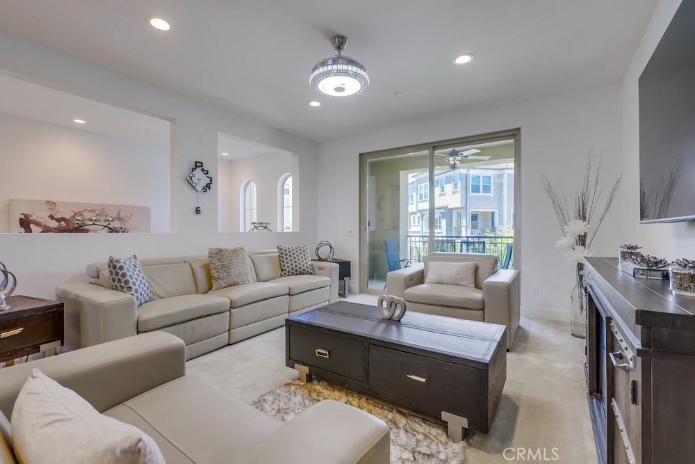 104 Alder Ridge Lake Forest, CA 92610 - Photo 7 of 74 a living room with furniture and a large window