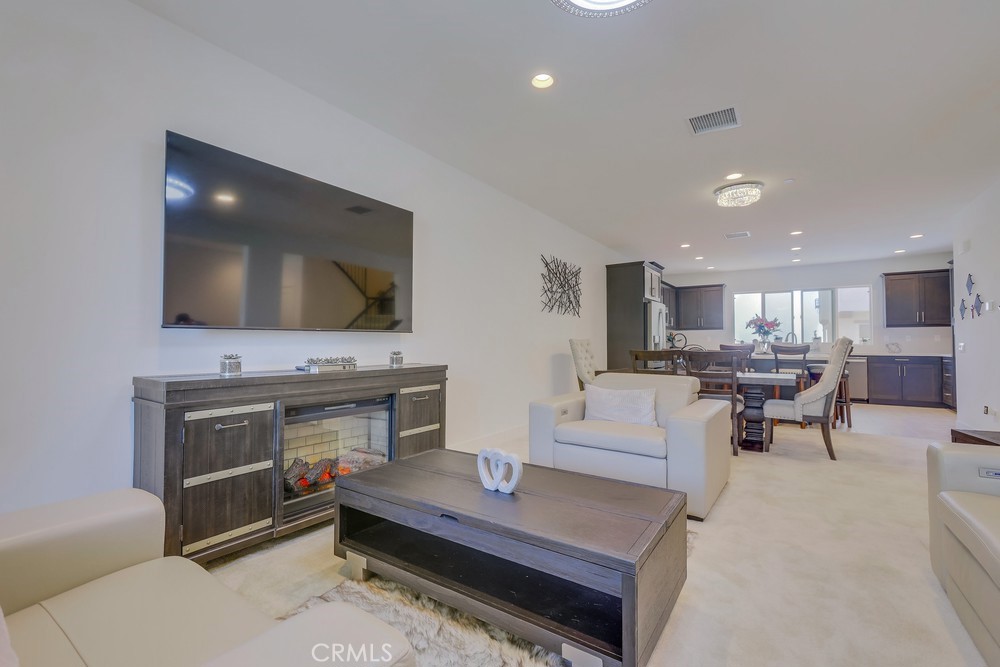 104 Alder Ridge Lake Forest, CA 92610 - Photo 8 of 74 a living room with furniture and a flat screen tv