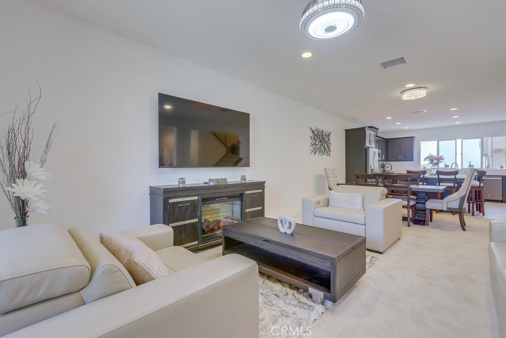 104 Alder Ridge Lake Forest, CA 92610 - Photo 9 of 74 a living room with furniture and a flat screen tv